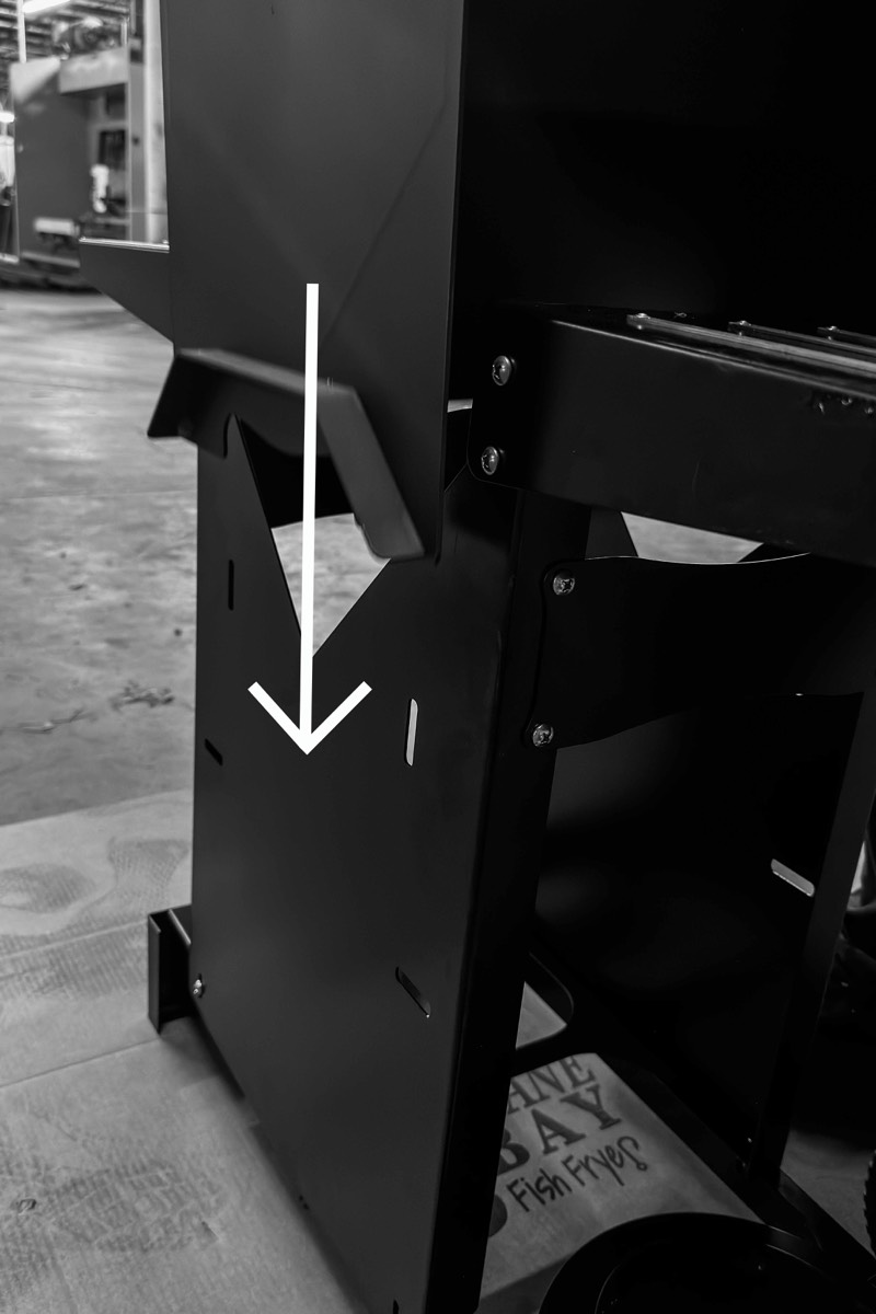 V-hull fryer pot being set into the chassis